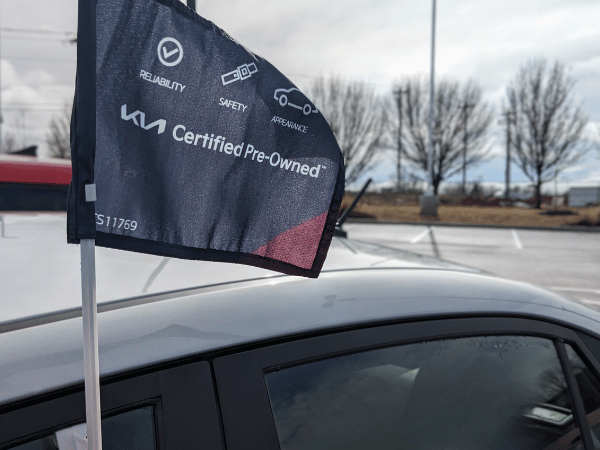 Kia Certified Pre-owned flag at Crain Kia of Fayetteville